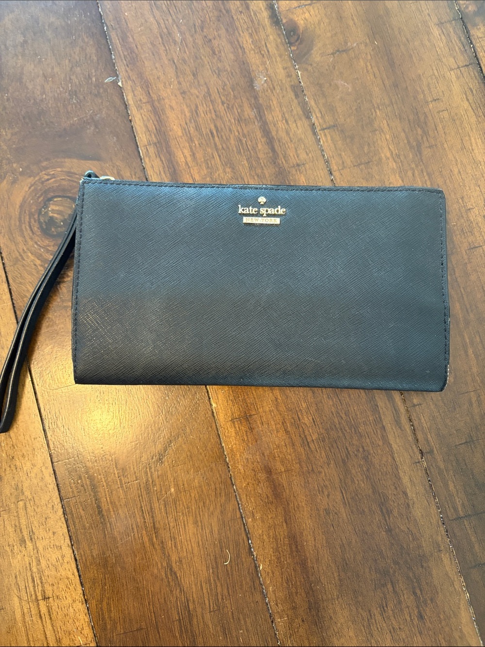 kate spade black wristlet clutch with gold logo